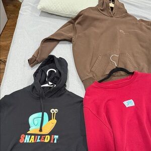 Brown, Black, and Red Hoodies